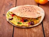 Eggs with pastrami and Rumi cheese