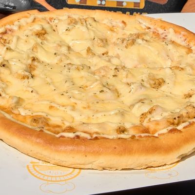 Oriental pizza with sausage and Kiri cheese