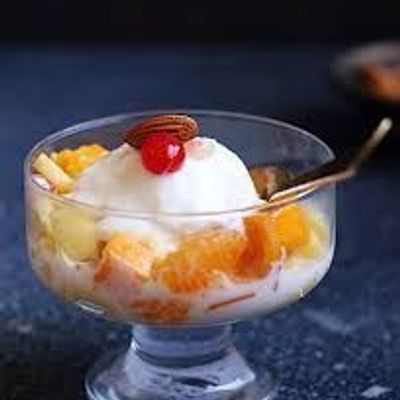 Seasonal fruit salad with ice cream