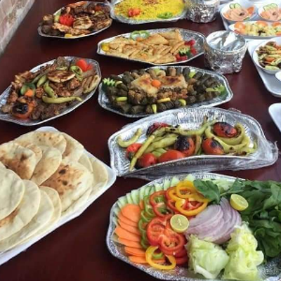 Grilled Chicken Meal On Charcoal And 2 Oriental Fatteh With Chicken Breasts On Grill