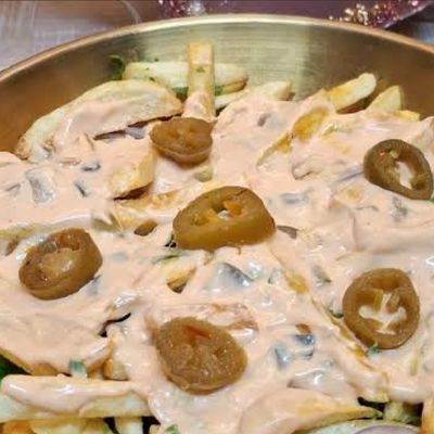 Potato dish with minced meat, cheddar, and jalapeño