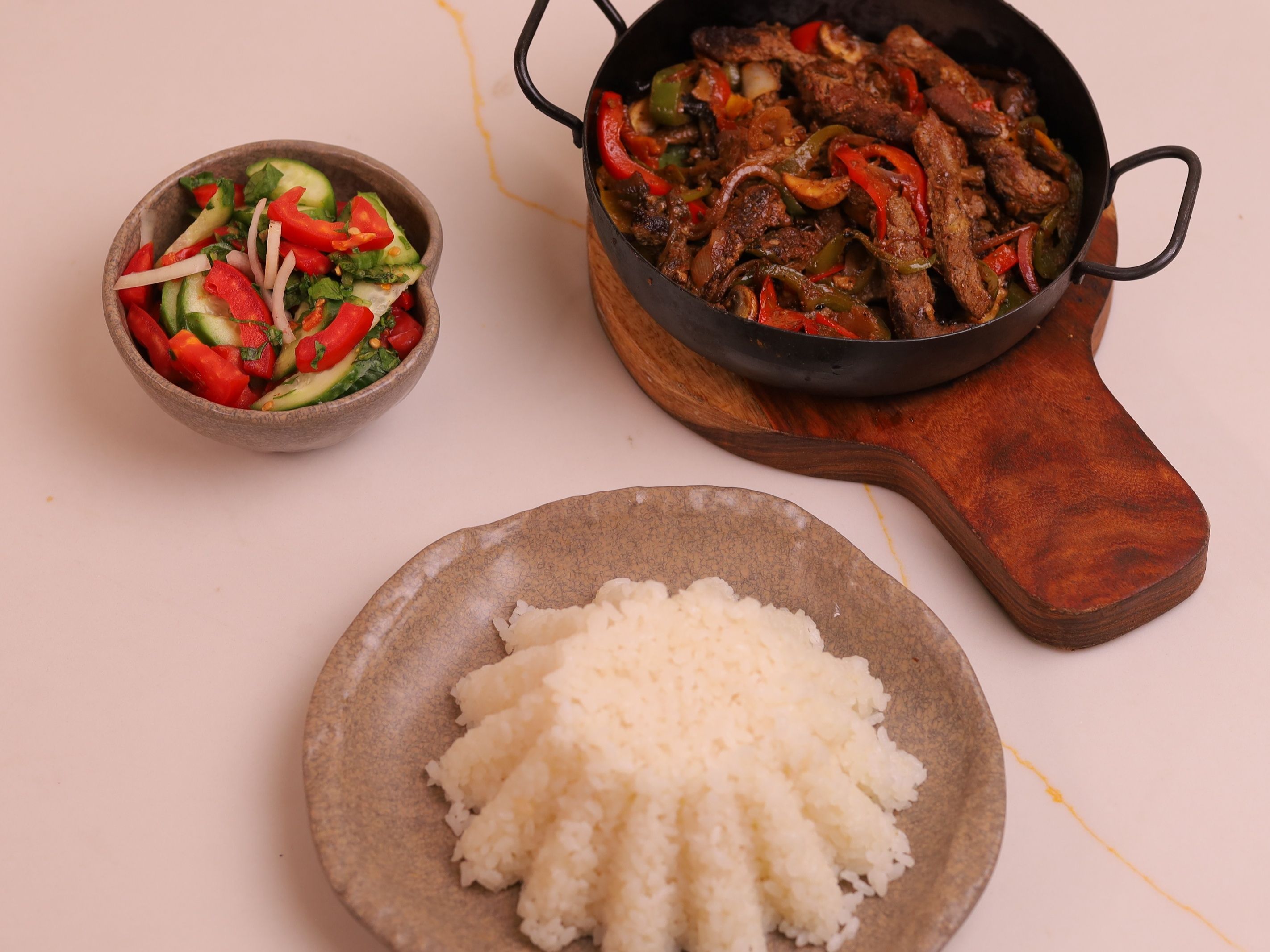 Beef fajitas with rice and green salad
