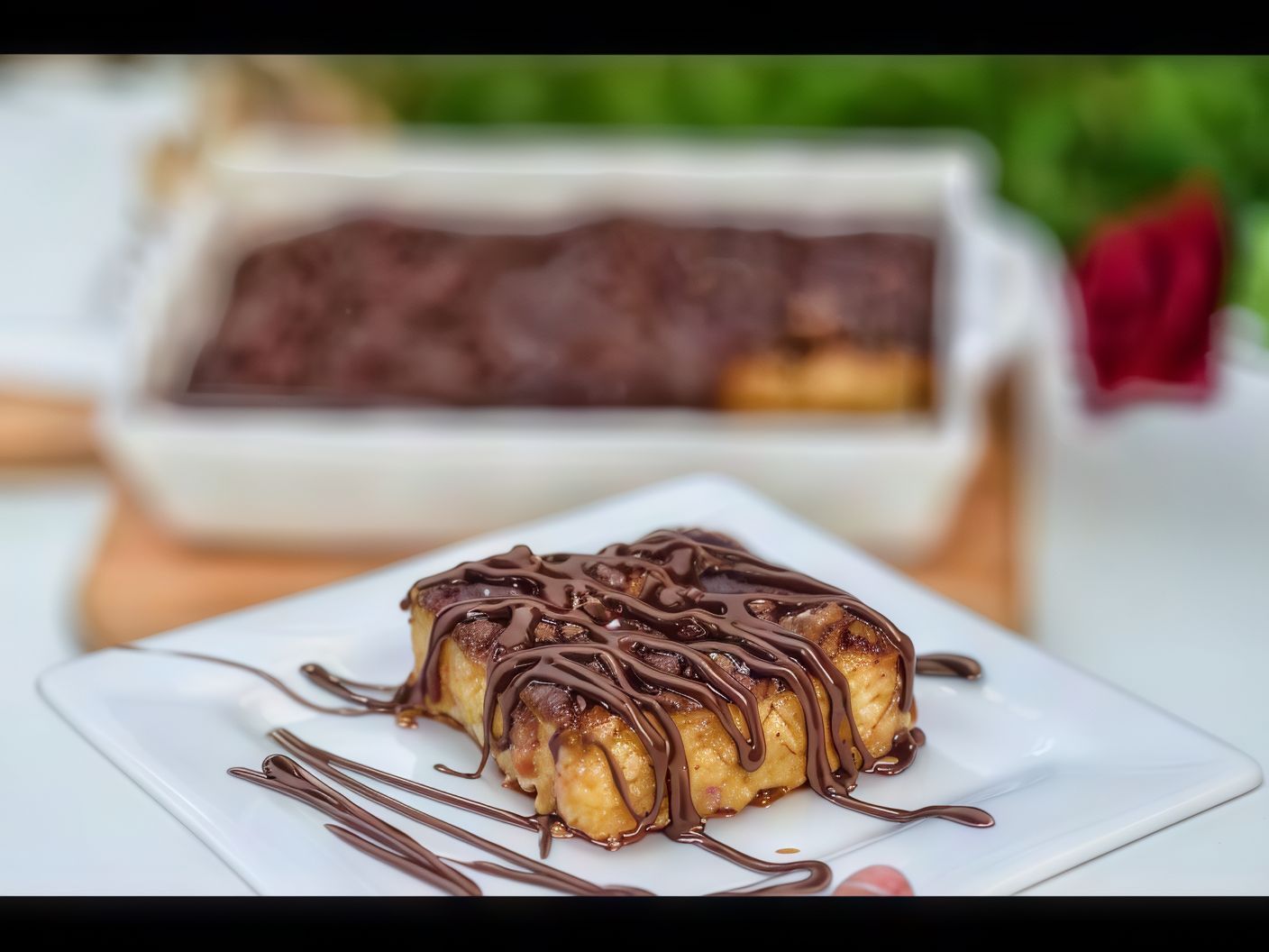 A tray of basbousa, Nutella, cream and apples