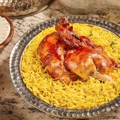 وجبة نصف دجاجة بنت الديك (أرز مندي أو بطاطس)