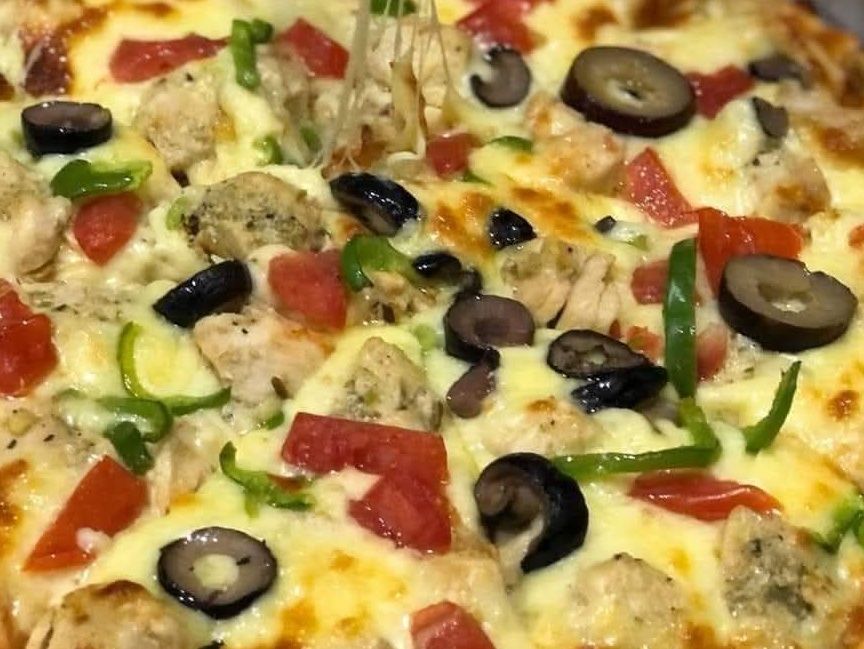 Baladi sausage pizza