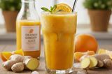 Orange cup with fresh ginger