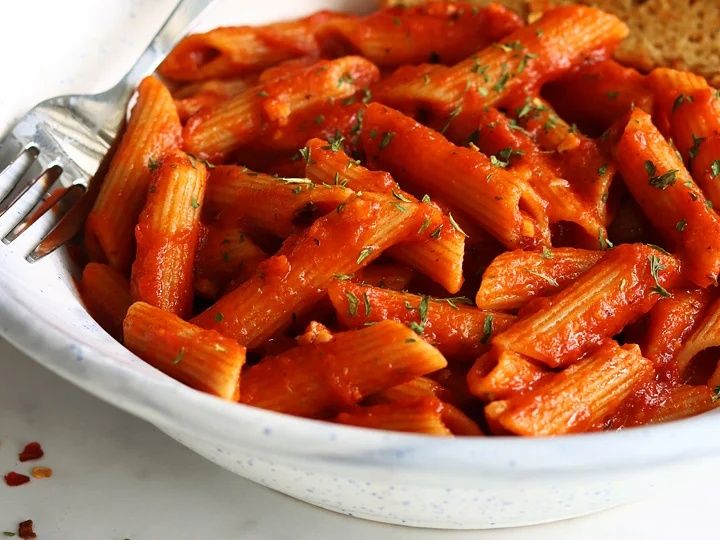 Pasta with red sauce and chicken shawarma
