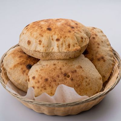 Plate of 7 Baladi bread loaves