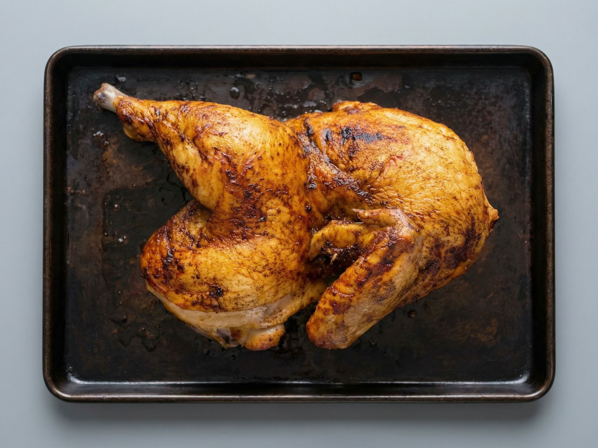Half a chicken on charcoal