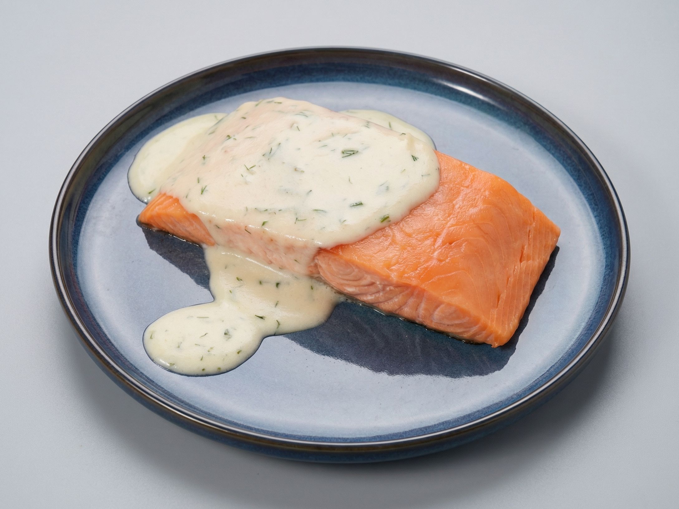 Grilled salmon dish with sauce