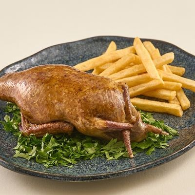 Stuffed pigeon with rice with potatoes