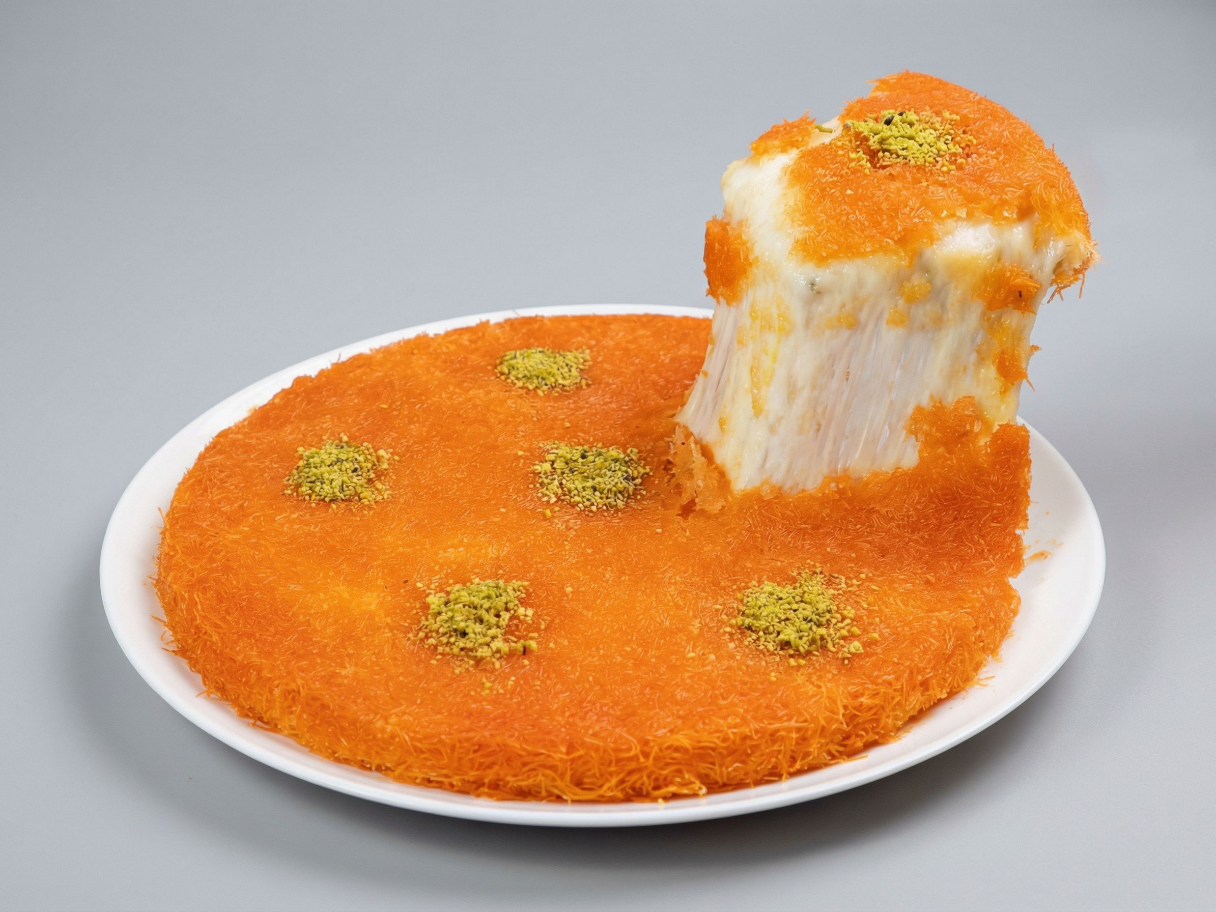 Rough Konafa With Cheese On Charcoal With Syrup
