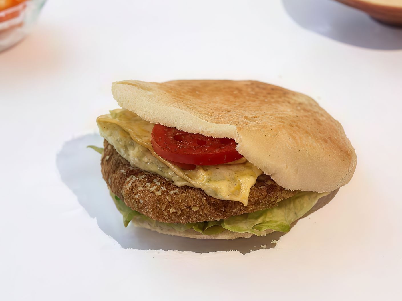 Green burger sandwich with Kiri cheese
