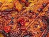 Quarter grilled chicken thigh