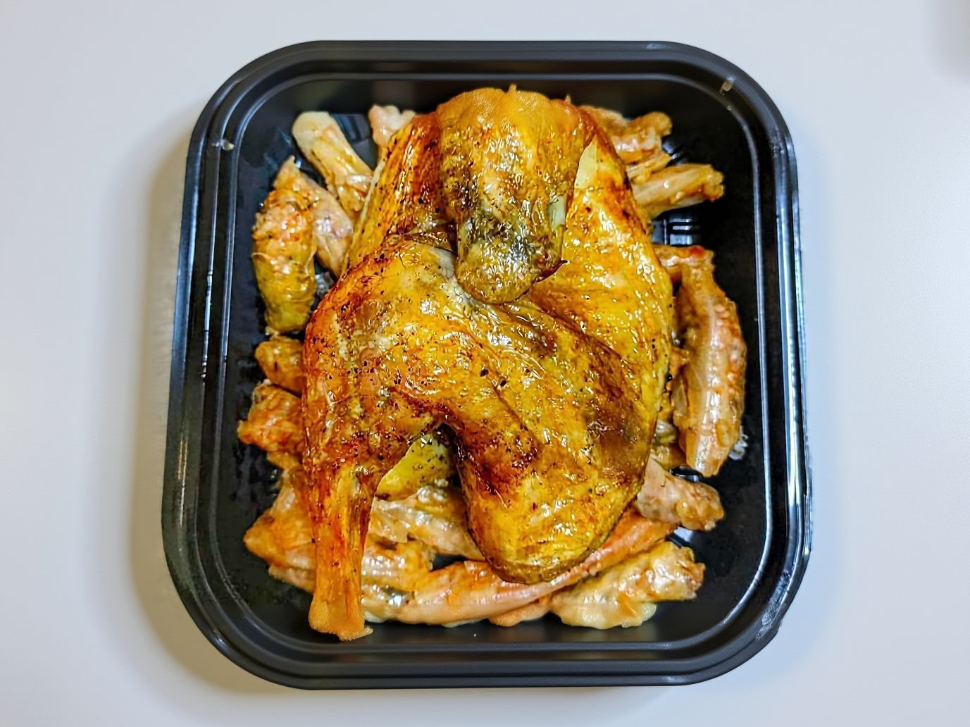 Half roasted chicken and mahshi cabbage