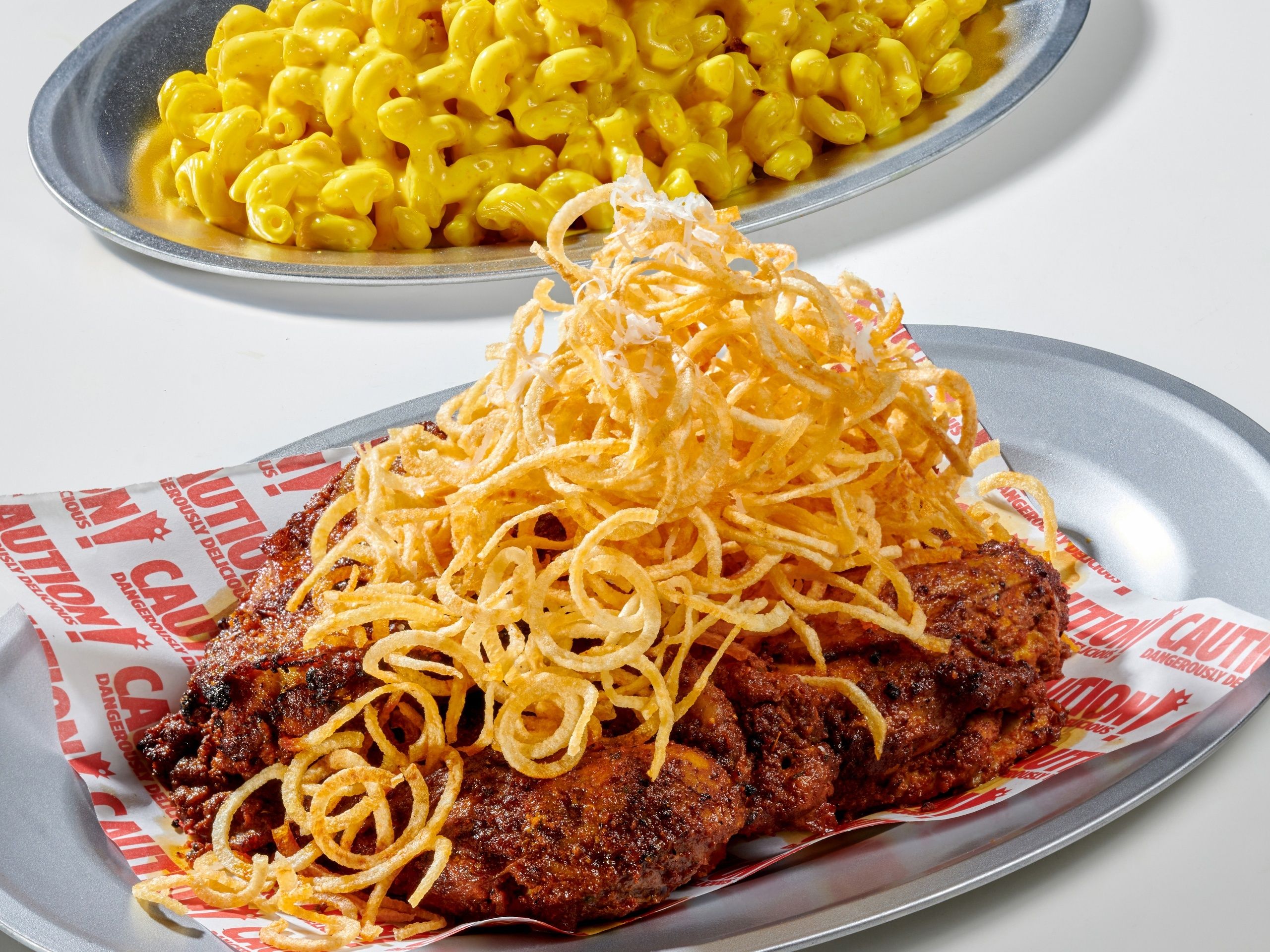 Whole Chicken Honey Truffle Shoestring fries, served with Mac & cheese