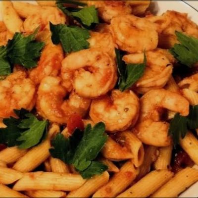 Penne pasta with shrimp and red sauce