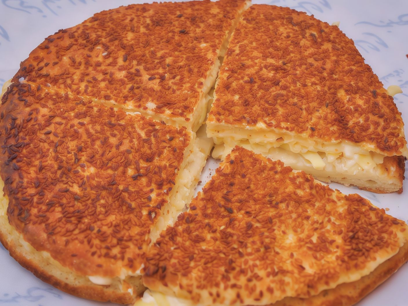 El Makhbaz cake with cheese and Zaatar