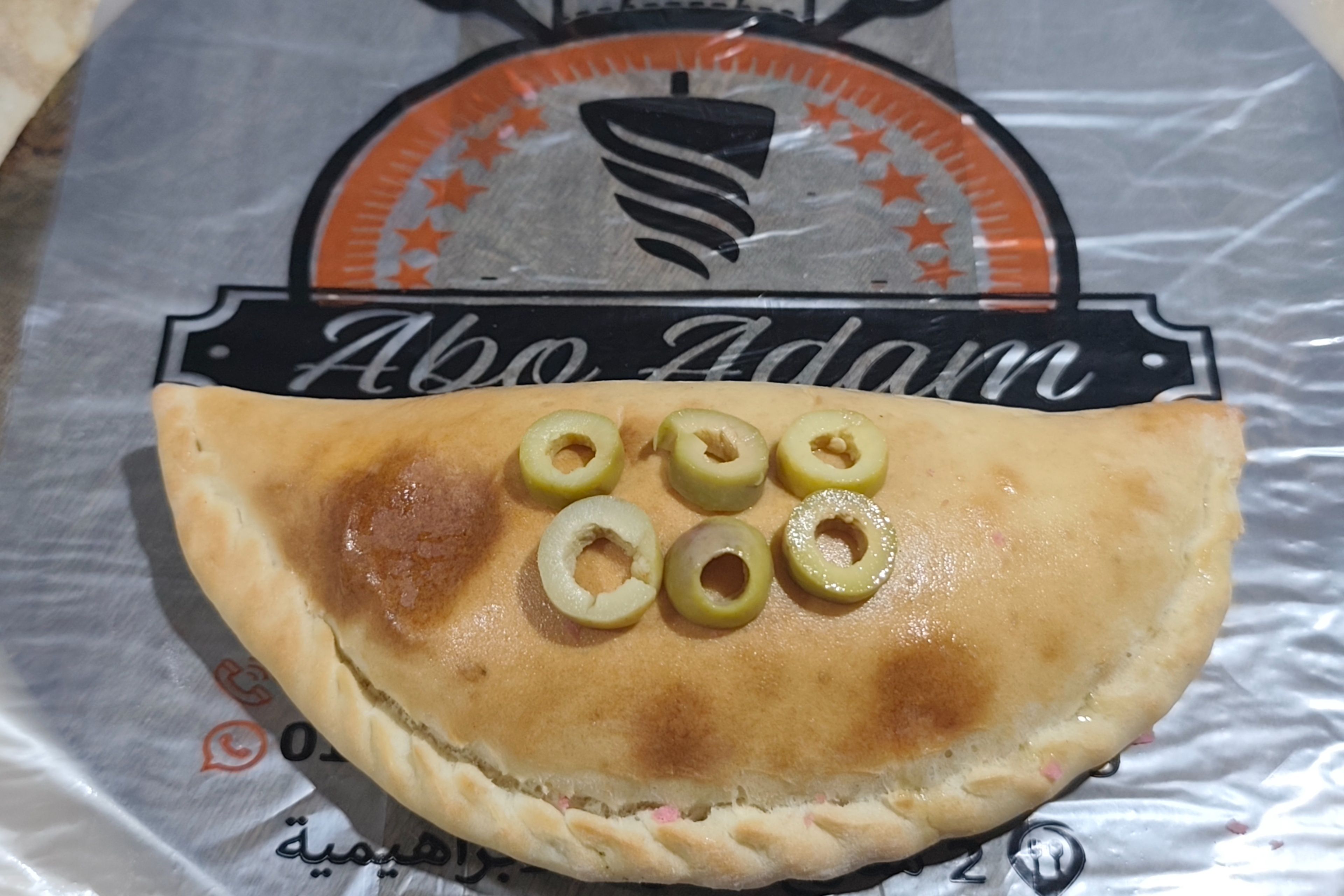Kiri cheese with olives