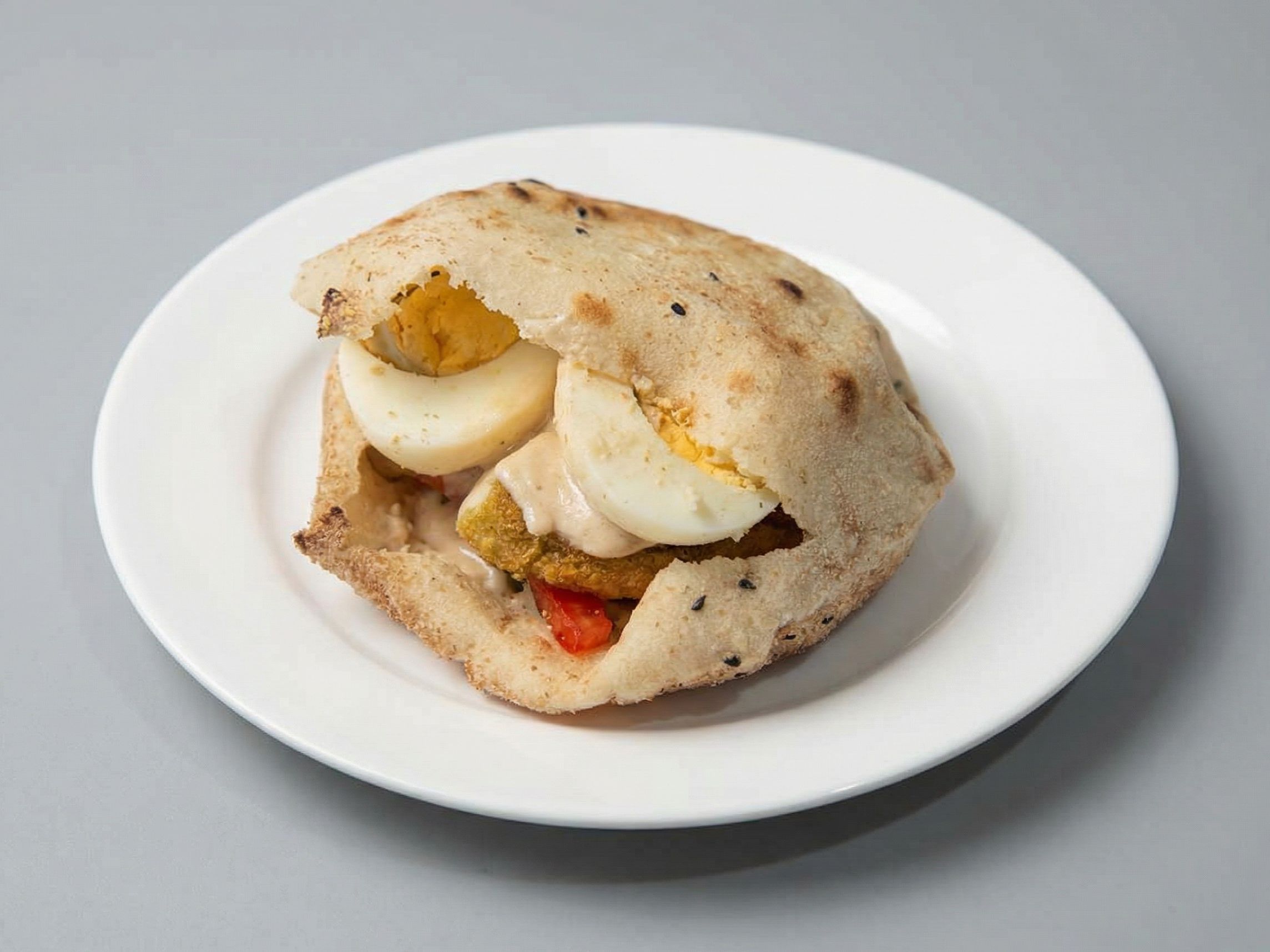 Stuffed Taamia With Boiled Eggs Sandwich