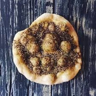 Olive and Mozzarella Manqousha