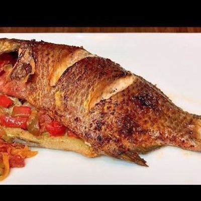 Grilled local tilapia with oil and lemon