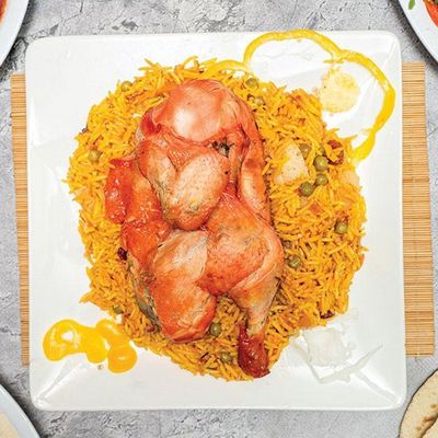 Half kabsa or biryani chicken with rice