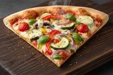 Large vegetable pizza slice