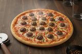 Pizza with kofta pieces