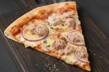 Large tuna chunks pizza slice