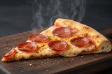 Large pepperoni pizza slice