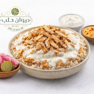 Chicken shawarma fattah with bechamel sauce