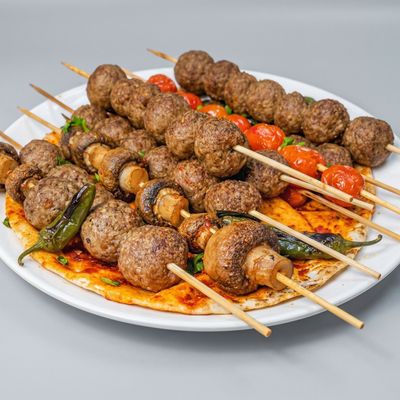 Kibbeh meal on a skewer