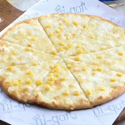 Manousheh with cheese and diet corn