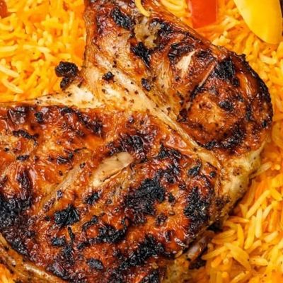A meal of a quarter chicken and basmati rice