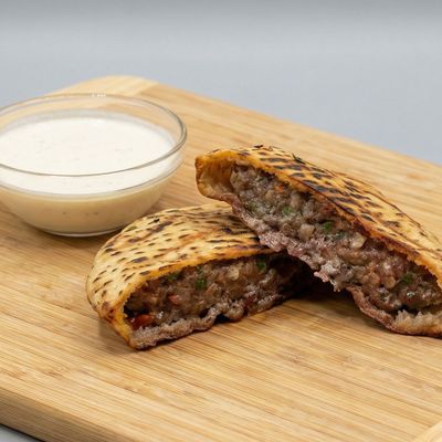 Meat and pastrami hawawshi