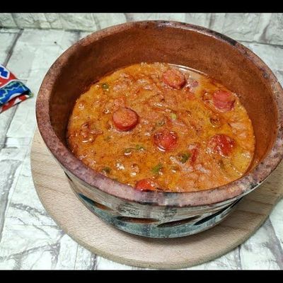طاجن فول مع سجق