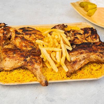 دجاجة كاملة مشوية على الفحم