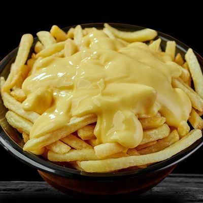 Potatoes with cheddar cheese sauce