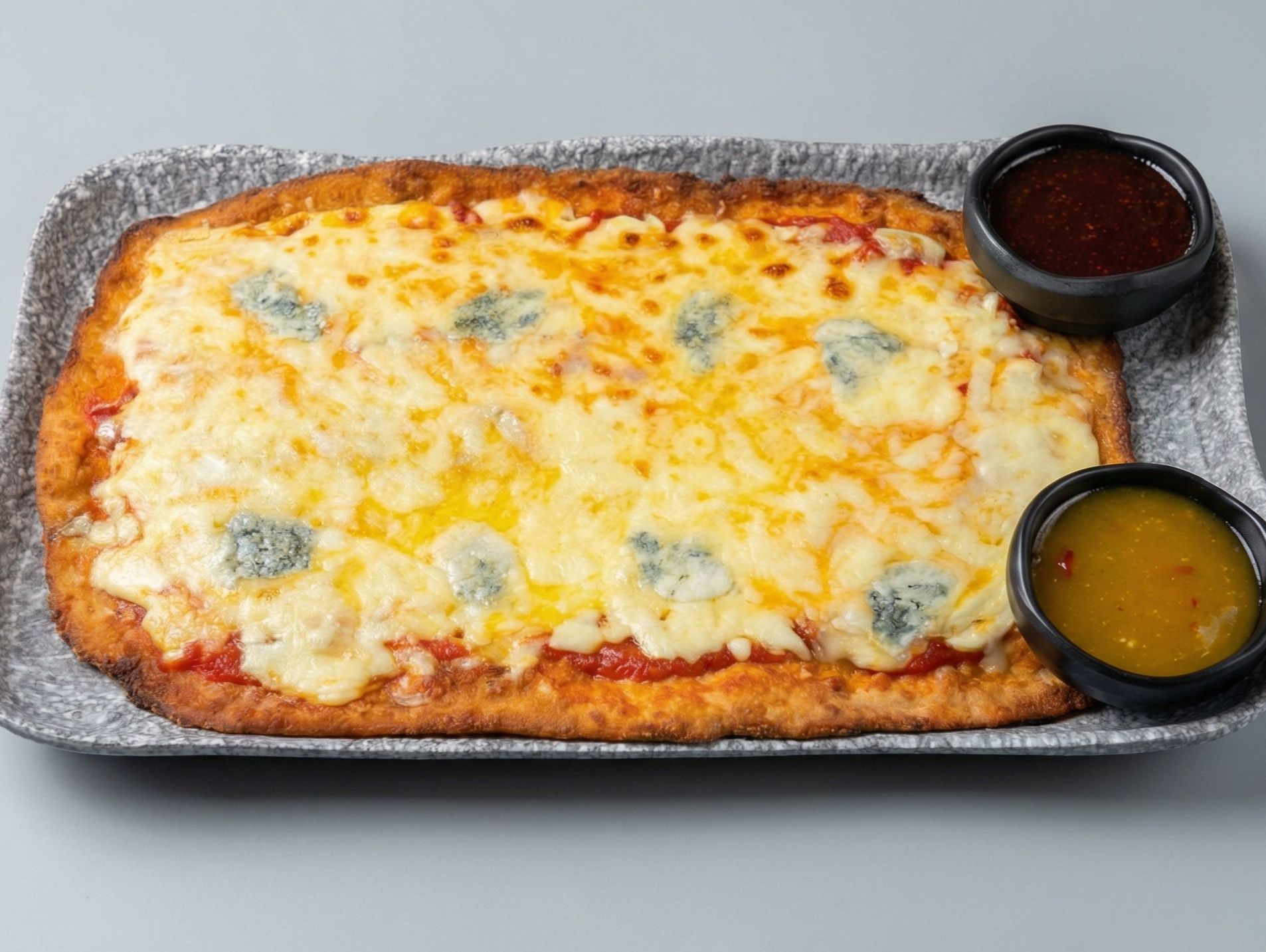Quattro Schnizza with a side dish