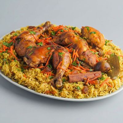 نصف دجاجة بخاري مع أرز