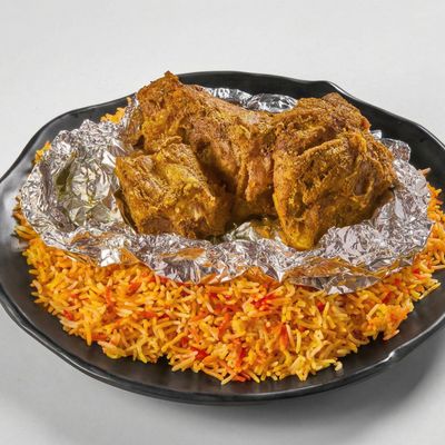 نصف دجاج حنيذ مع أرز