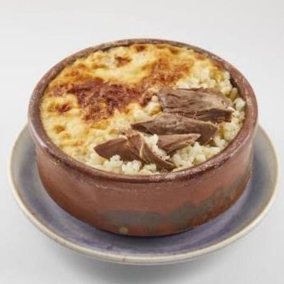 Tajin Moamar Rice With Pigeon