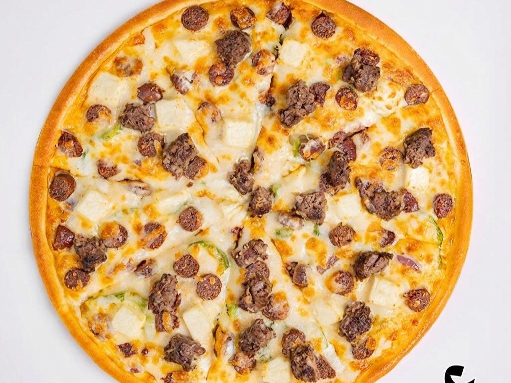 Baladi sausage pizza