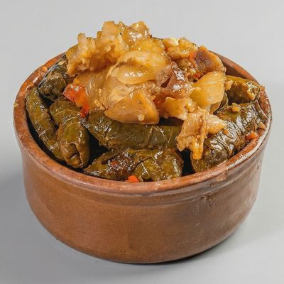 Grape leaves casserole with Knuckles