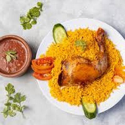 Half Biryani chicken with rice and sauce