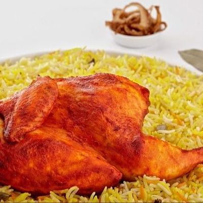 Half Bukhari chicken with rice and sauce