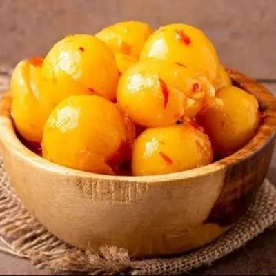 A Box Of Pickled Lemons With Safflower