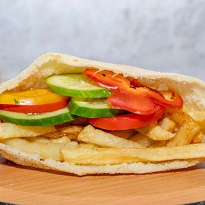 Fingers on Mix Pepper and Tomato Sandwich