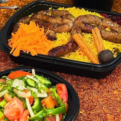 Quarter sausage meal with rice